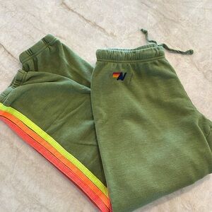 Aviator Nation Green Track Pants with Rainbow Stripe